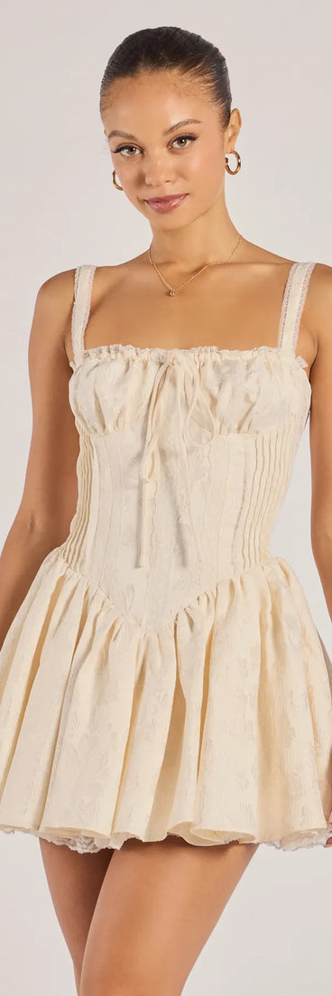 Flirt It Up Floral Jacquard Satin Corset Skater Dress, a trendy ivory mini dress featuring modern details and a fresh seasonal hue, perfect for creating chic 2025 looks.
