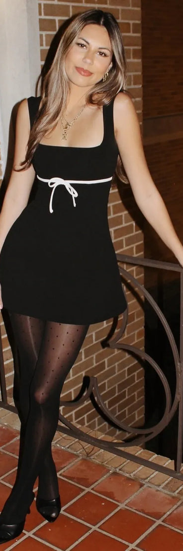 So Adored Sleeveless Bow Trim Crepe Mini Dress, a trendy black mini dress featuring modern details and a fresh seasonal hue, perfect for creating chic 2025 looks.