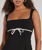 Step into winter chic with the So Adored Sleeveless Bow Trim Crepe Mini Dress, a black mini dress featuring an above-the-knee cut ideal for cocktail parties, festive gatherings, or clubwear.