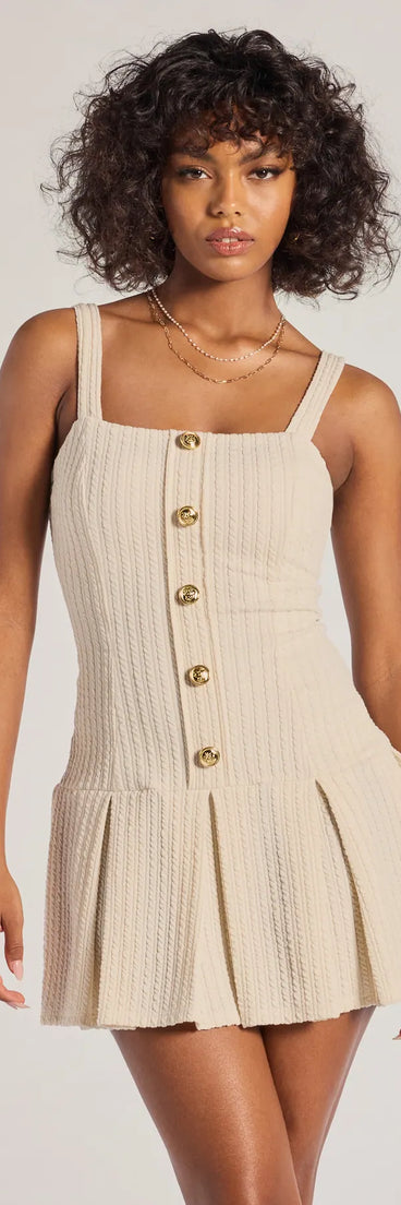 Step into milestone moments with the Elevated Button-Down Drop Waist Mini Dress, a standout in ivory dresses perfect for birdal showers, Easter celebrations, and 2025 grad looks.