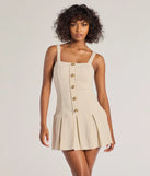 Step into milestone moments with the Elevated Button-Down Drop Waist Mini Dress, a standout in ivory dresses perfect for birdal showers, Easter celebrations, and 2025 grad looks.