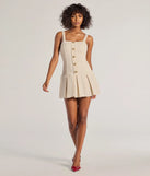 Make a bold statement in the Elevated Button-Down Drop Waist Mini Dress in ivory, the perfect spring dress for weddings, cocktail hours, nights out, and/or seasonal celebrations.