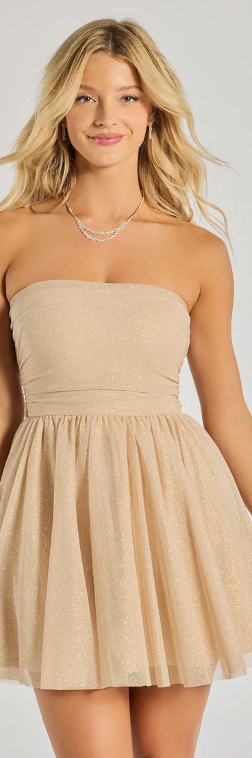 Shimmering Babe Glitter Mesh Strapless Skater Dress, a trendy beige mini dress featuring modern details and a fresh seasonal hue, perfect for creating chic 2025 looks.