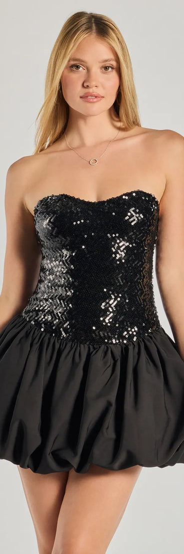 Make a bold statement in the Party Queen Sequin Strapless Bubble Hem Skater Dress in black, the perfect spring dress for weddings, cocktail hours, nights out, and/or seasonal celebrations.