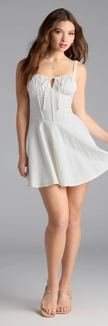 Soak up the season in the Bold New Look Corset Lace-Up Linen Skater Dress, a white sundress styled for easy days, outdoor plans, and everything in between.