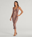 Make a bold statement in the Sultry And Sassy Zebra Print Halter Midi Dress in brown, the perfect spring dress for weddings, cocktail hours, nights out, and/or seasonal celebrations.