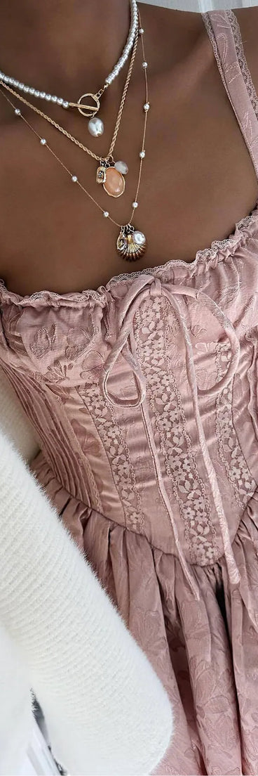 Make a bold statement in the Flirt It Up Floral Jacquard Satin Corset Skater Dress in mauve, the perfect fall dress for weddings, cocktail hours, nights out, and/or seasonal celebrations.