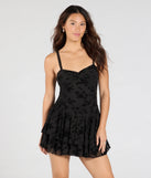 Feel confident and photo-ready in the Stealing Hearts Flocked Velvet Skater Dress, a black graduation dress perfect for 2025 ceremonies and parties.
