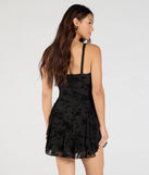 Make a bold statement in the Stealing Hearts Flocked Velvet Skater Dress in black, the perfect spring dress for weddings, cocktail hours, nights out, and/or seasonal celebrations.