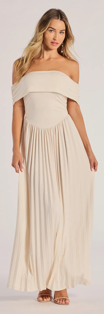 Soak up the season in the Compelling Romantic Off-The-Shoulder Pleated Maxi Dress, a ivory sundress styled for easy days, outdoor plans, and everything in between.