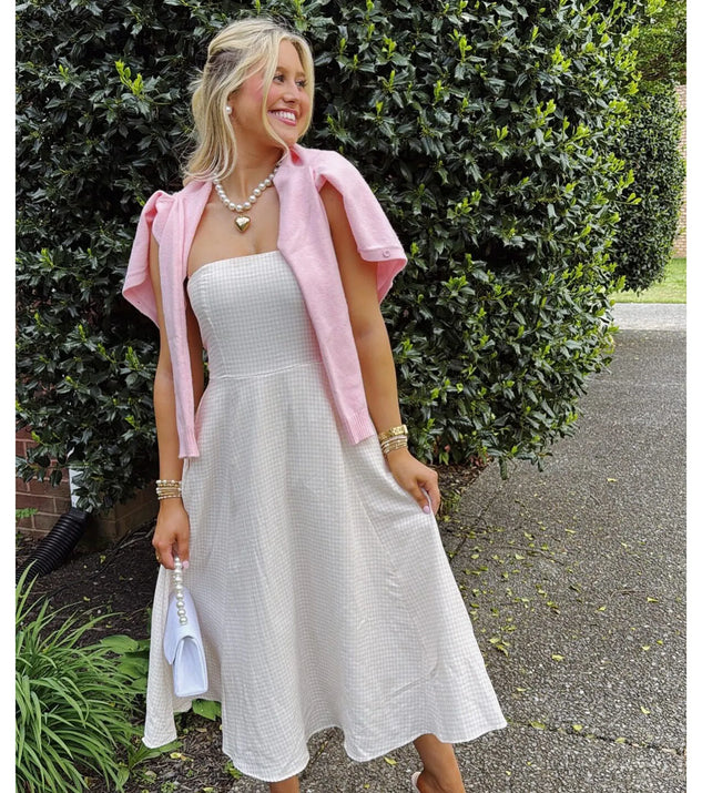 Shine with confidence, elegance, and standout style in the Love's A Picnic Strapless Gingham A-Line Midi Dress—a ivory graduation dress designed with a fresh silhouette and the latest trends.