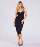 Step into summer looking effortlessly chic in the Alluring Glamour Rhinestone And Pearl Mesh Midi Dress in black, a must-have Windsor dress for your warm-weather wardrobe.