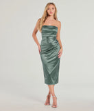 With its mid-calf hem and popular flattering fit, the Luxe Dream Strapless Satin Midi Dress in sage green nails the balance of trend and ease, redefining go-to midi dresses for any occasion.