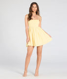 Shine with confidence, elegance, and standout style in the Sunny Tones Smocked Eyelet Skater Dress—a yellow graduation dress designed with a fresh silhouette and the latest trends.