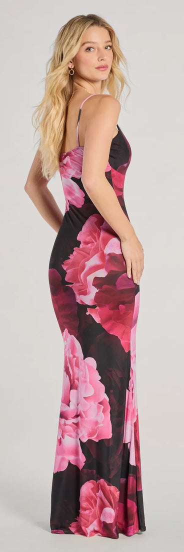 The Destination Paradise V-Neck Floral Maxi Dress is a stylish black floral dress featuring a fresh seasonal print and flattering design, perfect for garden parties, bridal showers, graduation celebrations, or everyday spring styling.