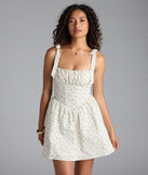 Shine with confidence, elegance, and standout style in the Flower Fields Lace-Up Corset Skater Dress—a ivory graduation dress designed with a fresh silhouette and the latest trends.
