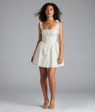 Shine with confidence, elegance, and standout style in the Flower Fields Lace-Up Corset Skater Dress—a ivory graduation dress designed with a fresh silhouette and the latest trends.