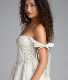 The Flower Fields Lace-Up Corset Skater Dress in ivory brings sleek style to any graduation outfit, from cap and gown to after-party.