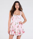 Feel confident and photo-ready in the Tea Time Corset Lace-Up Floral Skater Dress, a pink graduation dress perfect for 2025 ceremonies and parties.