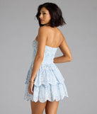 The Darling Sunshine Paisley Eyelet Skater Dress in white brings sleek style to any graduation outfit, from cap and gown to after-party.
