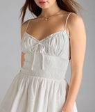 Feel confident and photo-ready in the Park Picnic V-Neck Eyelet Skater Dress, a white graduation dress perfect for 2025 ceremonies and parties.