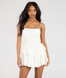 Feel confident and photo-ready in the Pretty Days Ahead Ruffle Eyelet Skater Dress, a white graduation dress perfect for 2025 ceremonies and parties.