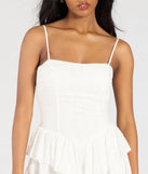 The Pretty Days Ahead Ruffle Eyelet Skater Dress in white brings edge and energy to your vibe, ready to elevate any festival look or concert outfit.