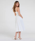 Make a bold statement in the Sunny Staple Square Neck Eyelet Midi Dress With Pockets in white, the perfect spring dress for weddings, cocktail hours, nights out, and/or seasonal celebrations.