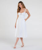 Make a bold statement in the Sunny Staple Square Neck Eyelet Midi Dress With Pockets in white, the perfect spring dress for weddings, cocktail hours, nights out, and/or seasonal celebrations.