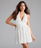 Shine with confidence, elegance, and standout style in the Cutesy Girl Polka Dot Skater Dress—a white graduation dress designed with a fresh silhouette and the latest trends.