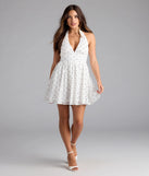 Shine with confidence, elegance, and standout style in the Cutesy Girl Polka Dot Skater Dress—a white graduation dress designed with a fresh silhouette and the latest trends.
