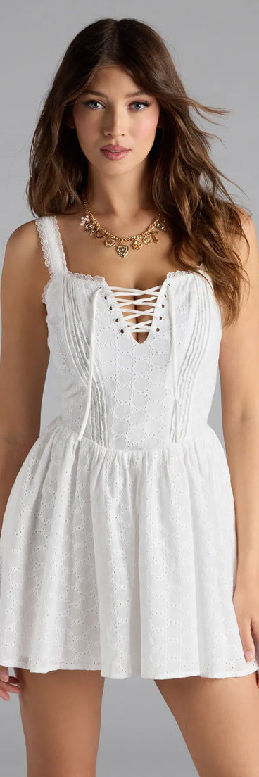 Soak up the season in the Sweetest Style Lace-Up Eyelet Skater Dress, a white sundress styled for easy days, outdoor plans, and everything in between.