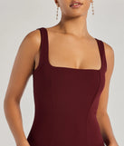Make a bold statement in the Timelessly Chic Sleeveless Flared Midi Dress in burgundy, the perfect spring dress for weddings, cocktail hours, nights out, and/or seasonal celebrations.