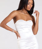 Make a bold statement in the Exquisite In Strapless Satin Midi Dress in white, the perfect spring dress for weddings, cocktail hours, nights out, and/or seasonal celebrations.