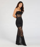 The Steal The Show Strapless Lace Maxi Dress is a stylish black lace dress, designed with intricate lace and an alluring silhouette, making it an elegant choice for Easter, weddings, or effortless spring looks.