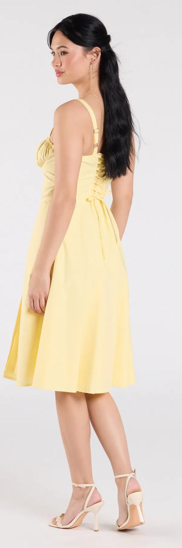 Whether you're headed to brunch or running errands, the Playful And Pretty Corset Lace-Up Midi Dress in yellow delivers effortless style in a breathable, go-to casual dress.