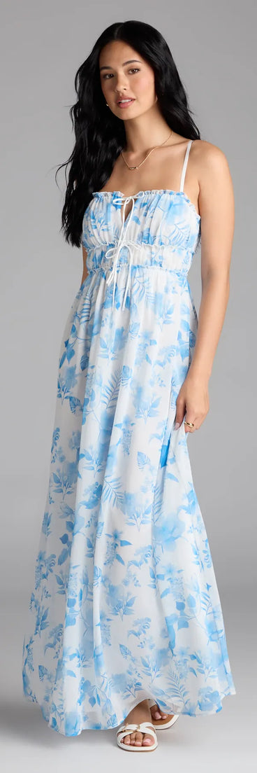 Step into summer looking effortlessly chic in the Sweet Beauty Floral A-Line Chiffon Maxi Dress in white, a must-have Windsor dress for your warm-weather wardrobe.