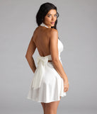 Own every entrance in the Twirl-Worthy Satin Halter Skater Dress, a white party dress perfect for milestone birthdays and grad parties, or dancing through summer nights and unforgettable bachelorette celebrations.