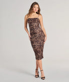 Make a bold statement in the On The Hunt Loepard Bodycon Midi Dress in brown, the perfect summer dress for weddings, cocktail hours, nights out, and/or seasonal celebrations.