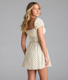 Whether you're headed to brunch or running errands, the Dearest Charm Bow Print Skater Dress in natural delivers effortless style in a breathable, go-to casual dress.