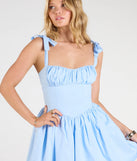 The Cute Soiree Sweetheart Skater Short Dress in light blue brings sleek style to any graduation outfit, from cap and gown to after-party.
