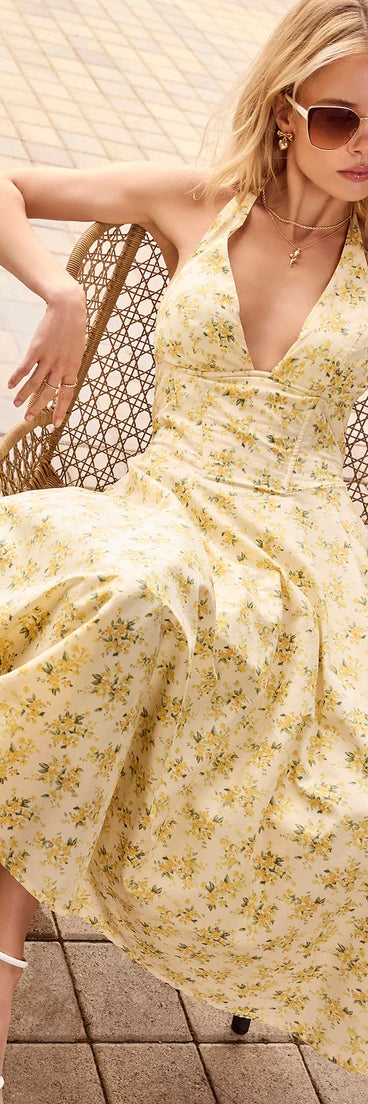 Feel confident and photo-ready in the Set For Spring Halter Corset Floral Midi Dress, a yellow graduation dress perfect for 2025 ceremonies and parties.