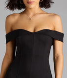 The Classic Babe Off-The-Shoulder A-Line Mini Dress in black brings sleek style to any graduation outfit, from cap and gown to after-party.