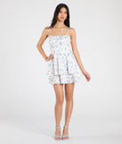 Make a bold statement in the Beauty In The Detail Tie Back Floral Skater Dress in white, the perfect spring dress for weddings, cocktail hours, nights out, and/or seasonal celebrations.