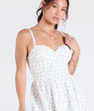 The One Cute Day Floral Skater Mini Dress in ivory brings sleek style to any graduation outfit, from cap and gown to after-party.