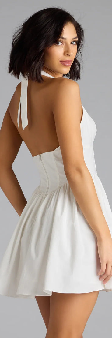 The Sweet Silhouette Drop Waist Skater Dress in white brings sleek style to any graduation outfit, from cap and gown to after-party.