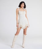 Shine with confidence, elegance, and standout style in the Desert Sun Lace Ruffle Mini Dress—a ivory graduation dress designed with a fresh silhouette and the latest trends.