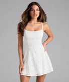 Shine with confidence, elegance, and standout style in the Sweet Lace-Up Cutout Eyelet Skater Dress—a white graduation dress designed with a fresh silhouette and the latest trends.