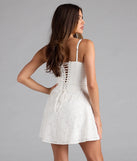 Shine with confidence, elegance, and standout style in the Sweet Lace-Up Cutout Eyelet Skater Dress—a white graduation dress designed with a fresh silhouette and the latest trends.