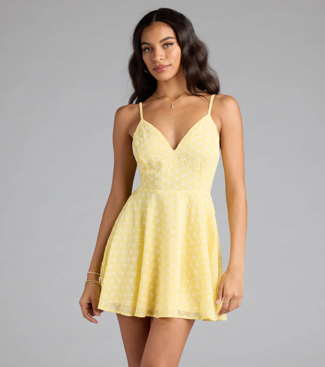 Soak up the season in the Cute Thing Tie-Back Eyelet Skater Dress, a yellow sundress styled for easy days, outdoor plans, and everything in between.